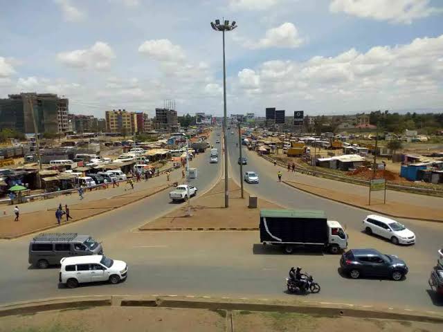 High-angle view of the Ruiru Eastern Bypass interchange road network in Kenya, highlighting infrastructure expansion that drives nearby commercial property and land acquisition.