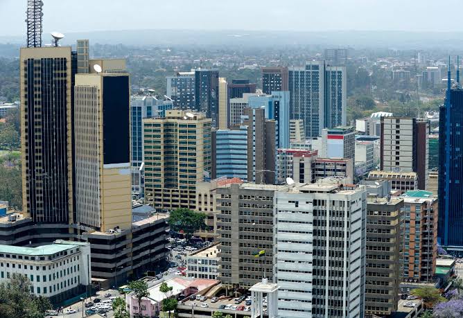 High-angle view of the Nairobi CBD skyline in Kenya, highlighting modern high-rise office buildings, commercial towers, and premium corporate real estate developments under a clear sky.