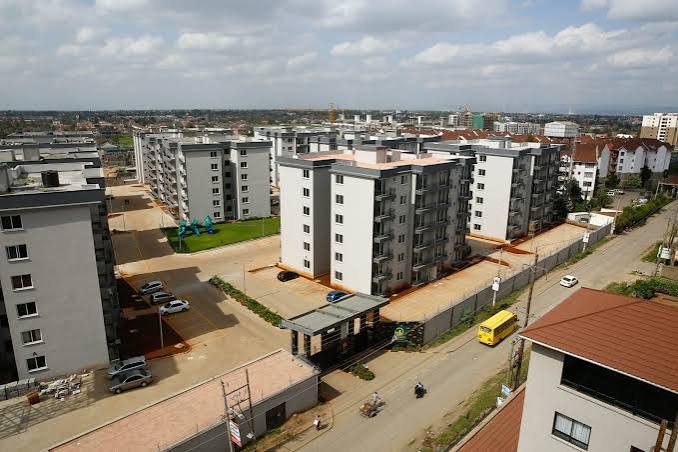 Aerial drone view of the Sunpark Residences apartment complex in Syokimau, Kenya, highlighting high-density residential properties and real estate investments near the Nairobi SGR Terminus.